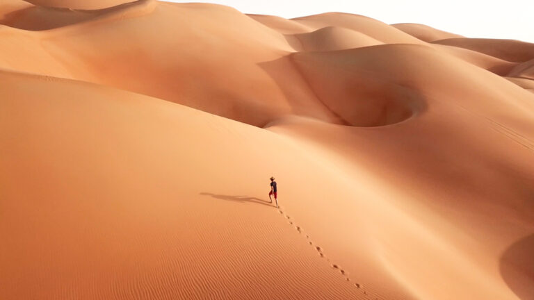 Aerial,drone,view,of,a,young,athletic,caucasian,tourist,in